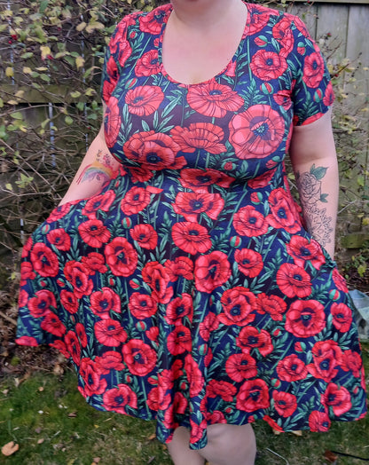 Red Poppies (purple ground) Short sleeve Skater Dress
